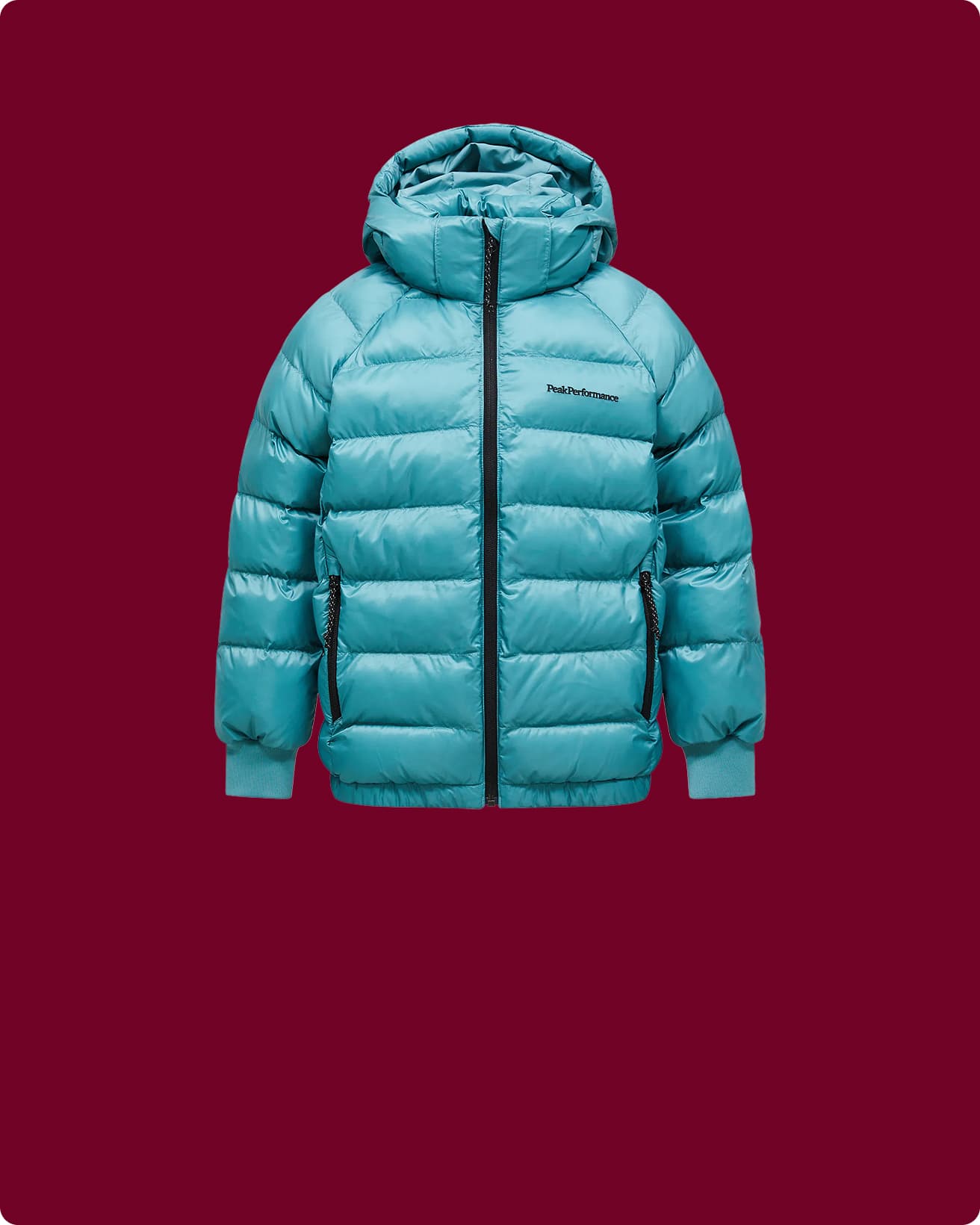 Turquoise puffer jacket on a maroon background.
